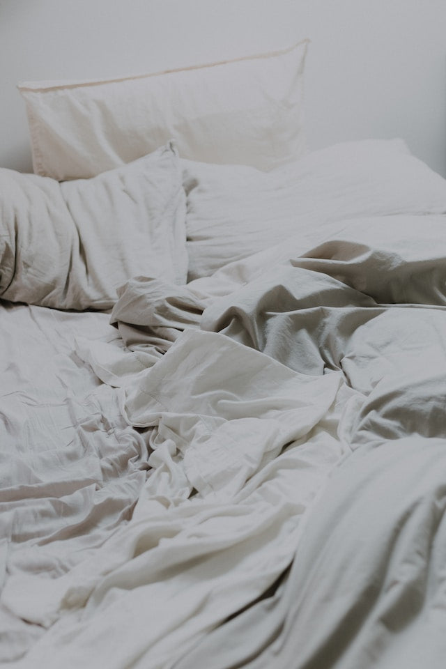 mussed sheets in a bed