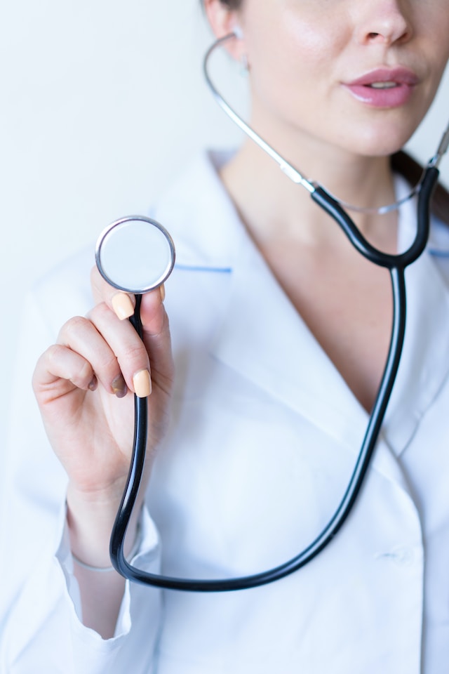 gynecologist holding a stethoscope 