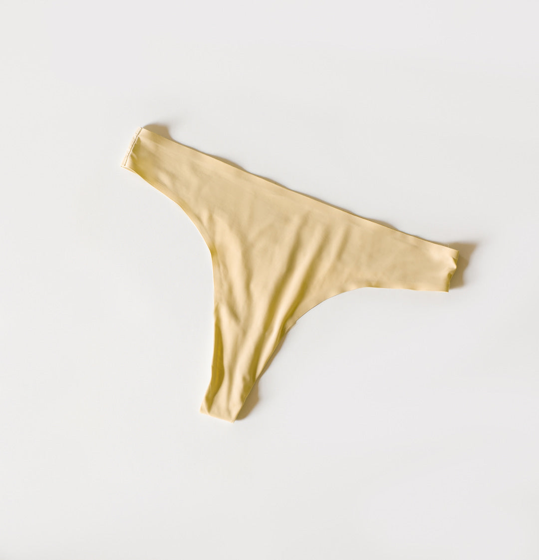 a thong in pale yellow