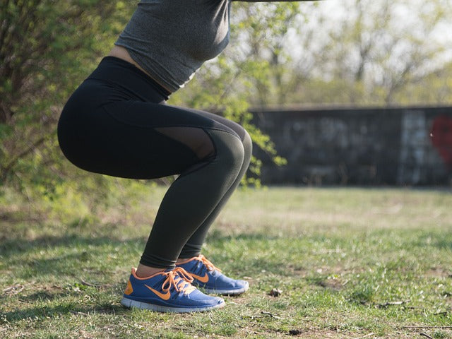 woman strengthening her pelvic floor
