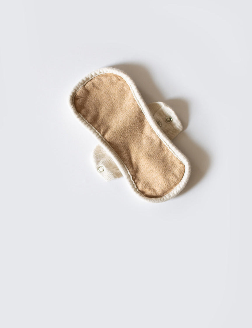A reusable cloth pad is one option for natural feminine products