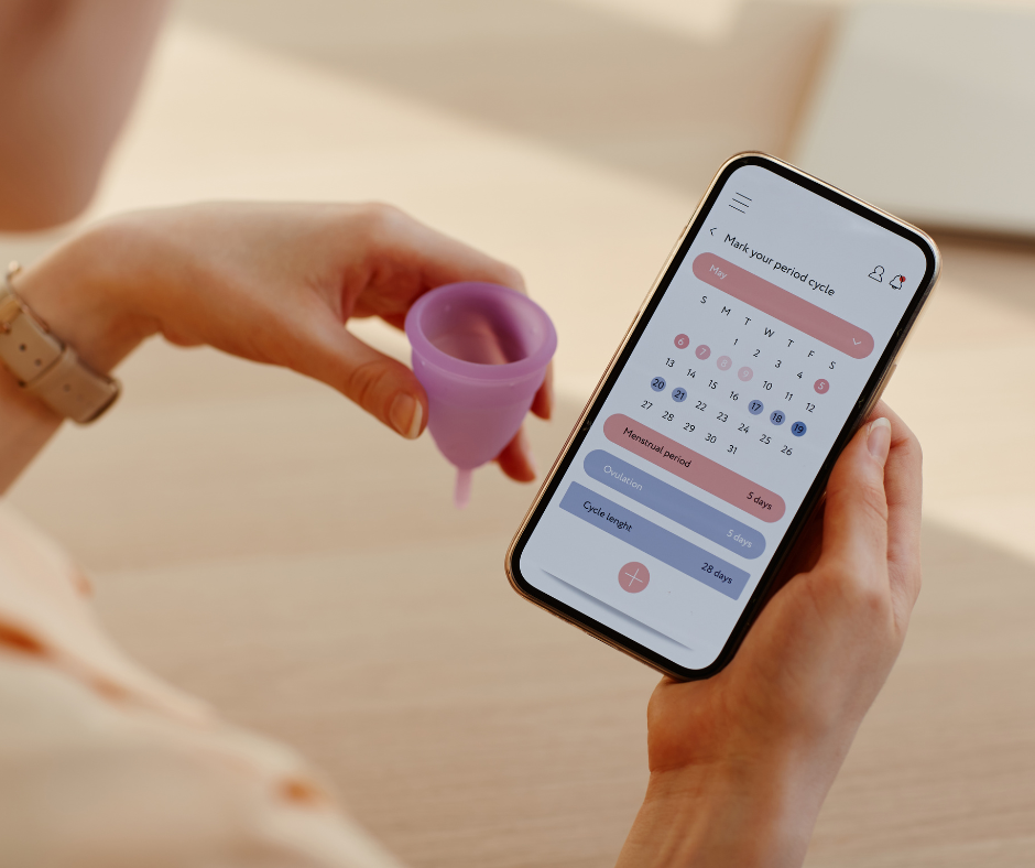 woman uses app to track her menstrual cycle