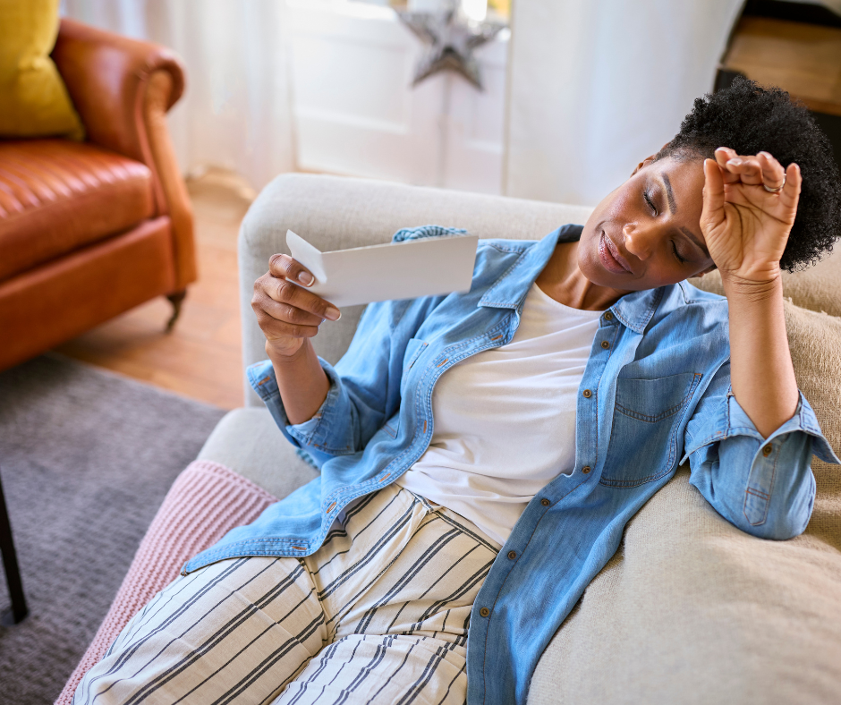 A woman having a hot flash, one of the symptoms of perimenopause