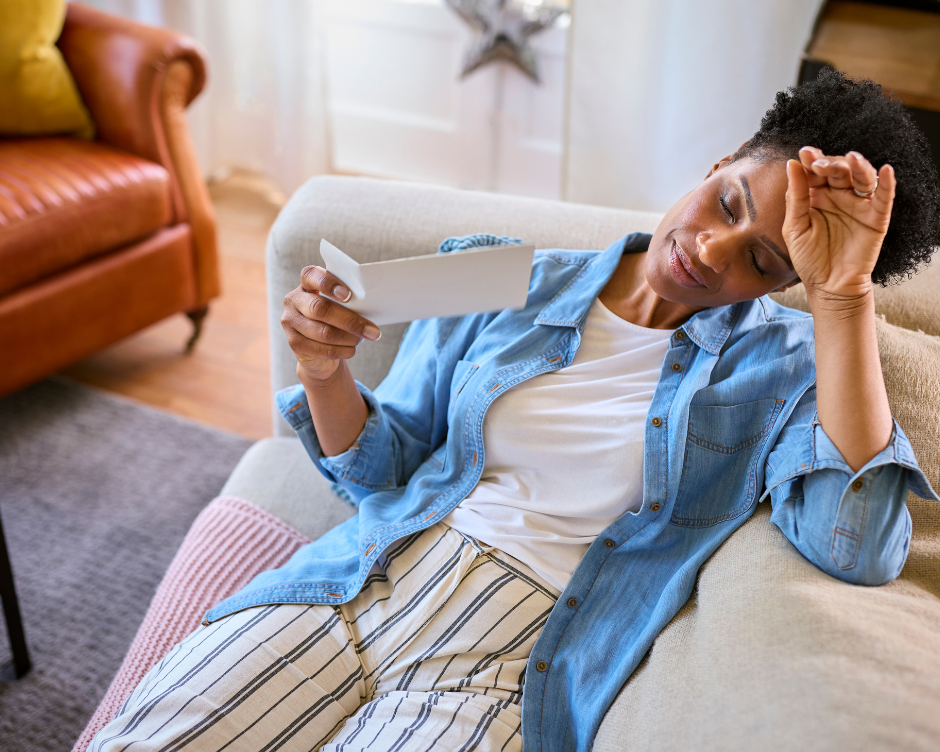 A woman having a hot flash, one of the symptoms of perimenopause