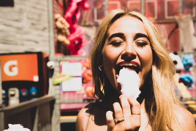 Woman enjoying cotton candy
